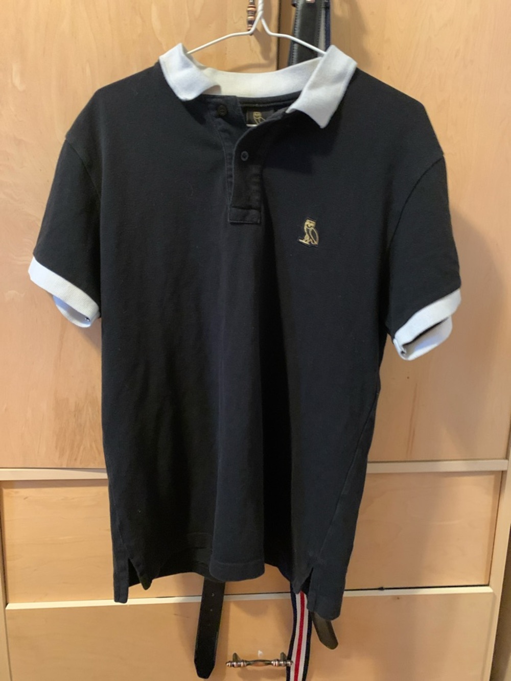OVO Black Polo with White Collar & Sleeve Cuffs and Gold Owl Emblem